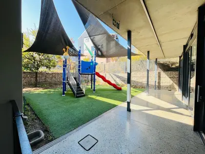 a playground in a building with a play area at Spacious 2 Bedroom Apartment in Midrand, Waterfall City - Business and Family friendly - 12 Elizabeth Place in Midrand