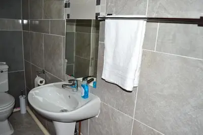 a bathroom with a sink and a toilet at Soldout Camp 2 in Pretoria