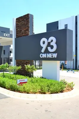 a sign that says on new in front of a building at Soldout Camp 1 in Johannesburg