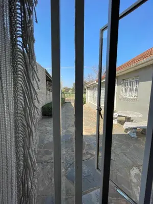 a view from the door of a patio at Smartshelter Richard in Pretoria