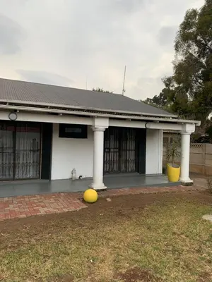 a house with a yellow ball in front of it at TnB Guesthouse in Middelburg