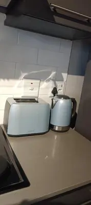 a slow cooker and a toaster on a counter at Circa unit 91 in Pretoria