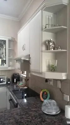 a kitchen with a sink and a counter top at Pecanwood Estate Cosy home 3 bedrooms with pool in Hartbeespoort