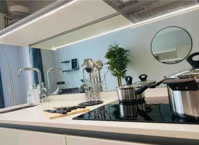 a kitchen counter with a pot on a stove at Views on the six in Midrand