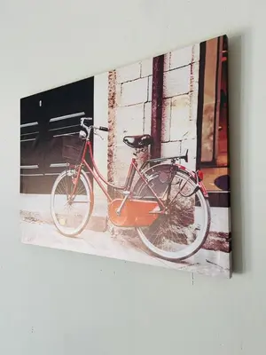 a painting of a bike parked next to a building at SERENE ACCOMMODATION PALACE in Bela-Bela