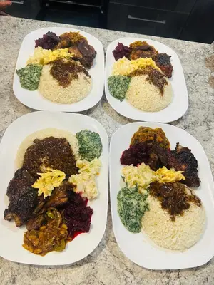 a group of plates of food on a table at MBT Guesthouses in Ga-Mothiba