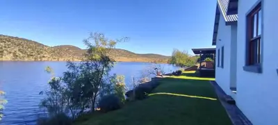 a view of a lake from a house at Fish Eagle Bay View, Warmbaths in Bela-Bela