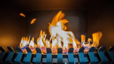 a close up of a fire burns on a keyboard at Homes of Ace Diamond in Pretoria