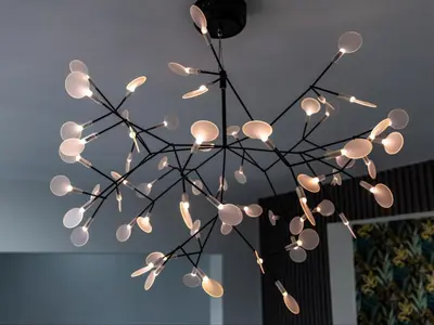 a chandelier with white lights hanging from a ceiling at Panorama Villa in Graskop