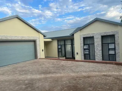 a rendering of a house with a garage at De Marea villa in Naboomspruit