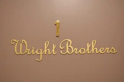 a wall with a sign that readswitch bathroom at Barnstormers Rest in Malelane
