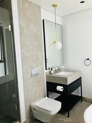 a bathroom with a sink and a toilet and a mirror at Thango Res in Johannesburg