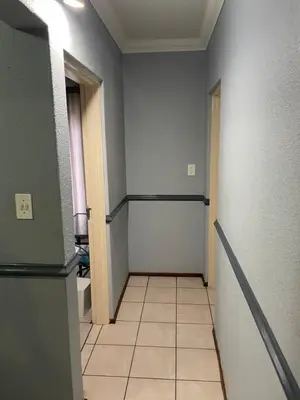 a room with a hallway with a tile floor at Pendleberry Grove Unit 51 in Bela-Bela