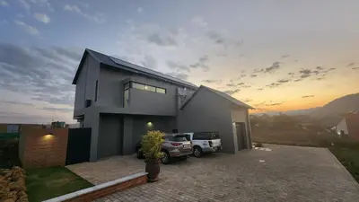 a house with a car parked in front of it at Bluebell House@799 in Dullstroom