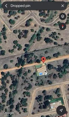 an overhead view of a house with a red heart at Bela Waterfront Villa in Bela-Bela