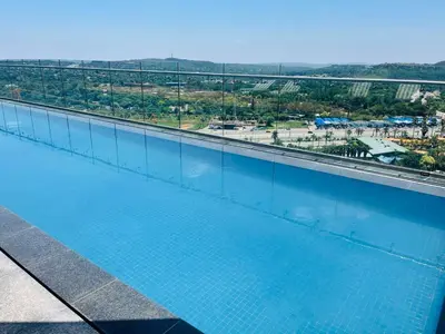 an overhead view of a swimming pool on a building at Menlyn Maine Luxury Apartments 11th & 14th floor with Balcony in Pretoria