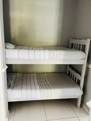 a couple of bunk beds in a room at Pendleberry Grove Unit 36 in Bela-Bela