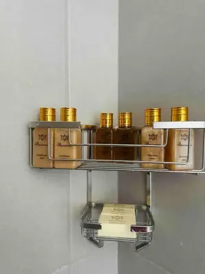 a shelf with a bunch of bottles on it at Angel’s Nest Nelspruit in Nelspruit
