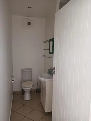 a bathroom with a toilet and a sink at 612 @ Leisure Bay in Pretoria