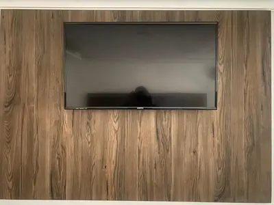 a reflection of a person in a mirror in a room at Hotel El Infinito in Kempton Park
