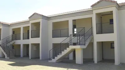 a building with stairs on the side of it at DZUVHA VILLAGE INN in Thohoyandou