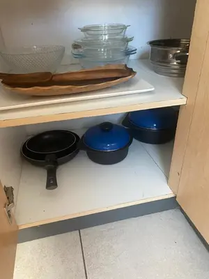a shelf with four blue bowls in a refrigerator at Mamuka Africa in Midrand