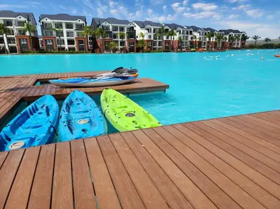 a group of kayaks sitting on a dock in a pool at 297 The Blyde Crystal Lagoon in Pretoria