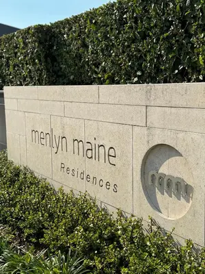 a sign for the marilyn minniereresbestosbestosccess at The Trilogy Apartment MM 51011 in Pretoria