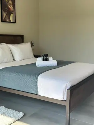 a bed in a room with at SUumthing Private GuestHouse in Lebowakgomo