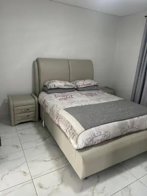 a bed with two pillows on it in a bedroom at 955 Highlands Gate Golf Estate in Dullstroom