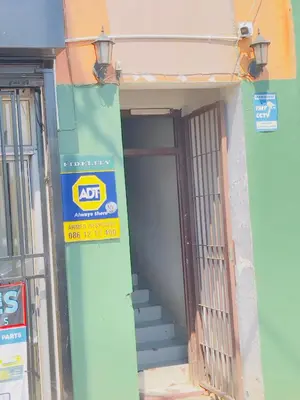 an entrance to a building with a door and stairs at Sunrise Guest Inn in Pretoria