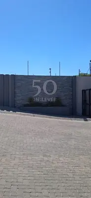 a sign on the side of a building at The Ace apartment @50 on lever(with backup power) in Midrand
