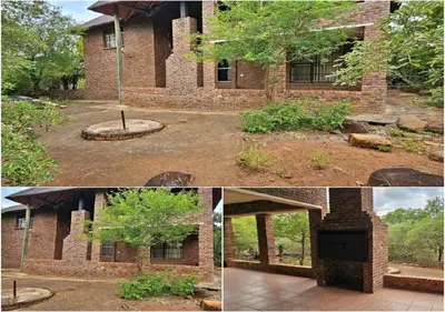 a brick building with a tree in front of it at Adder way around to Kruger in Marloth Park