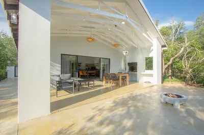 an open living room and dining room of a house at Maroela Safari House in Marloth Park