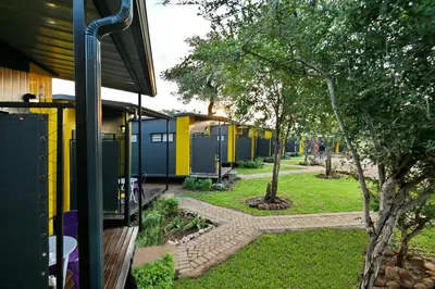 a row of tiny houses in a park at SleepOver Punda Maria Gate in Punda Maria