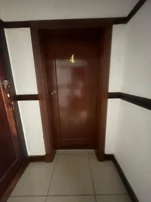 a hallway with a door with a number forty on it at Khaya Mnandi Leisure Suites in Pretoria