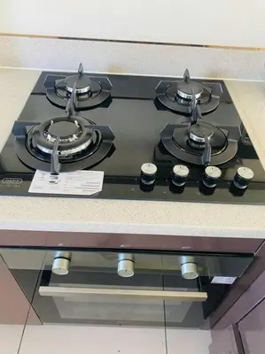 a stove top sitting on top of a counter at LuxuryHome in Midrand