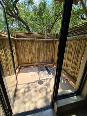 a view of a screened in porch with a fence at Rosendal Kruger View Villa in Marloth Park