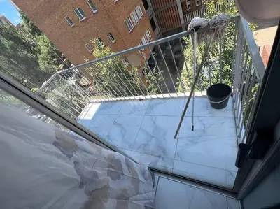 a view of a balcony with a pot on it at Beyond Comfort Apartment in Pretoria