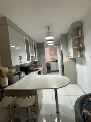 a kitchen with a table and chairs in a room at Blissful stay in Polokwane