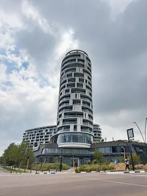 a tall building with a lot of windows at ERL Ellipse Waterfall. in Midrand