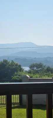 a view of a balcony with a view of the water at View on 83 in Tzaneen
