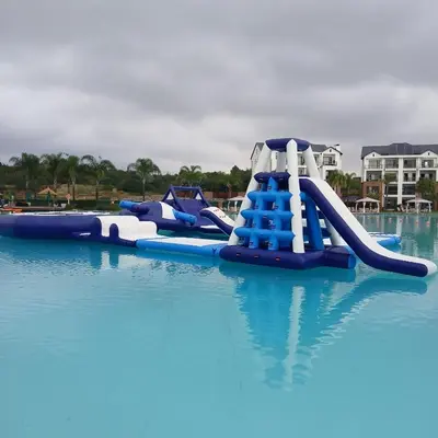 a water slide in the middle of a swimming pool at The Blyde: 2-Bed Luxe Apartment in Pretoria