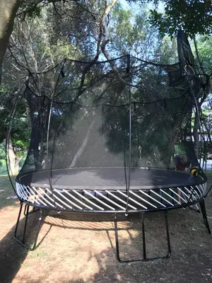 a swing in a park with a canopy at Kruger Park Farmstay near Orpen Gate in Hoedspruit