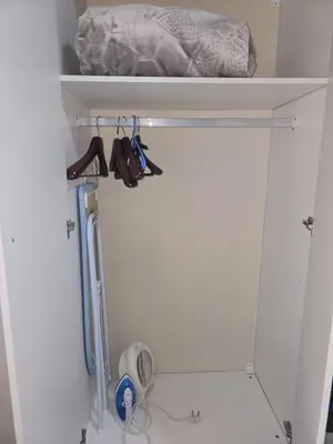 a closet with a shelf and tools on it at Peshline Guest House Unit 2 in Ermelo