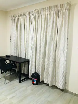 a room with a desk and a table and a window at Peshline Guest House Unit 3 in Ermelo