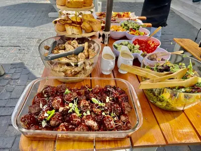 a table with a bunch of food on it at Villameyer Lodge in Pretoria