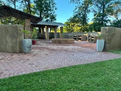 a brick patio with a pavilion in a park at Azalea Accommodation in Northam