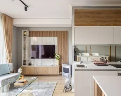 a kitchen and a living room with a counter top at Cosy Ellipse 2012 Waterfall Midrand in Midrand