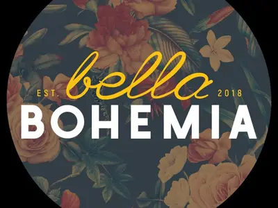 a sign for a festival with flowers on it at Bella Bohemia Spa, Venue and Guest Farm in Roodeplaat